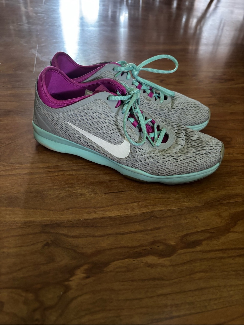 Nike Women’s Gray & Teal Athletic Trainers with Purple Lining